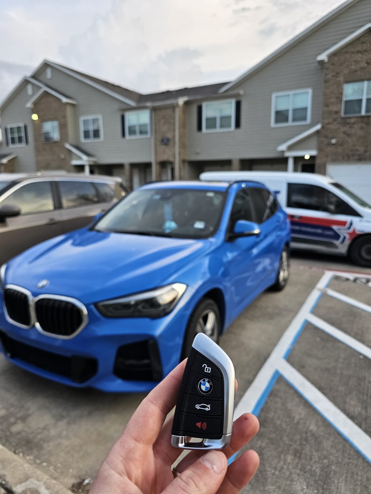 BMW X1 key fob replacement with Texan Locksmith service van