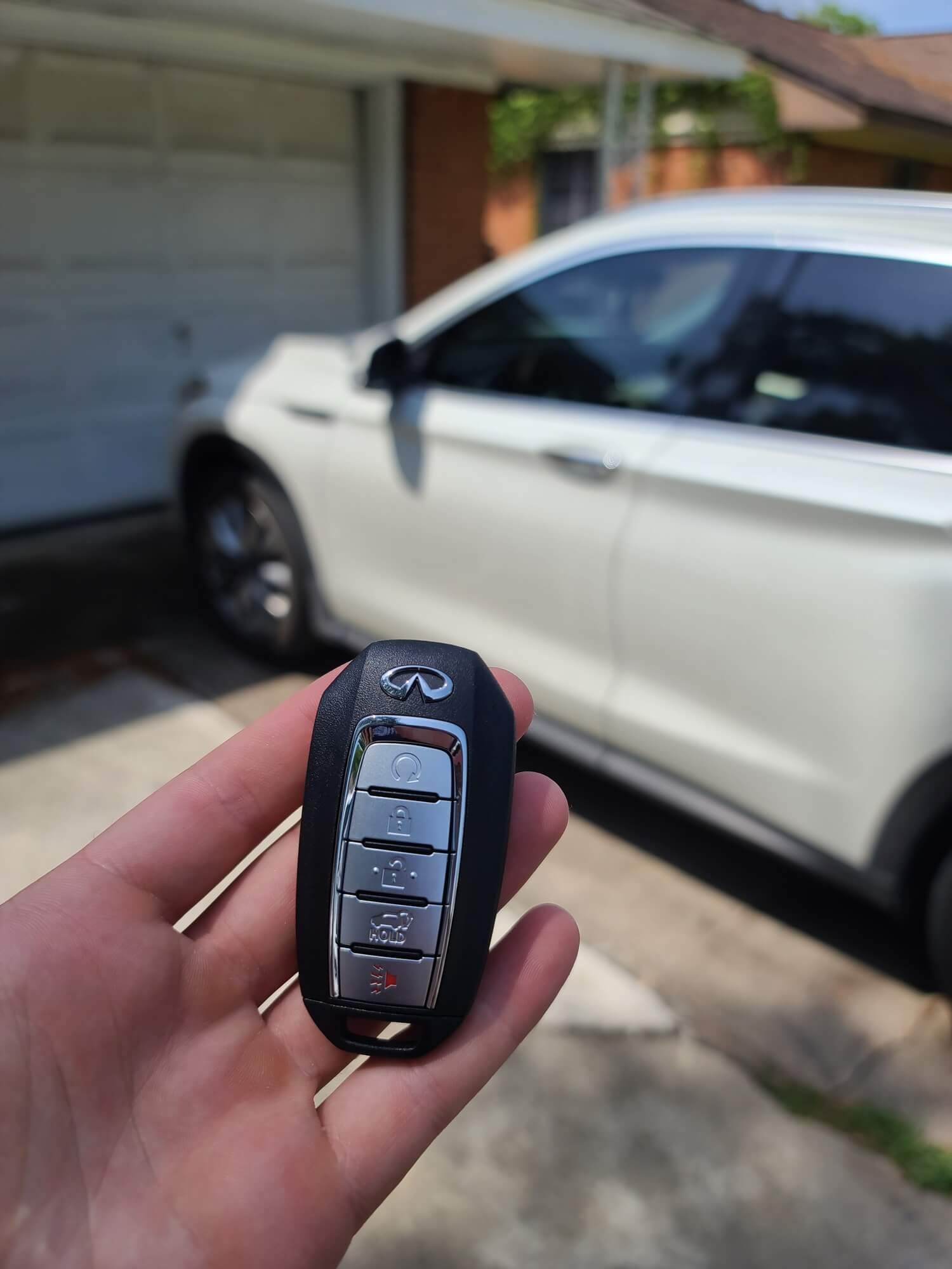 Infiniti replacement key fob programmed by Texan Locksmith Houston