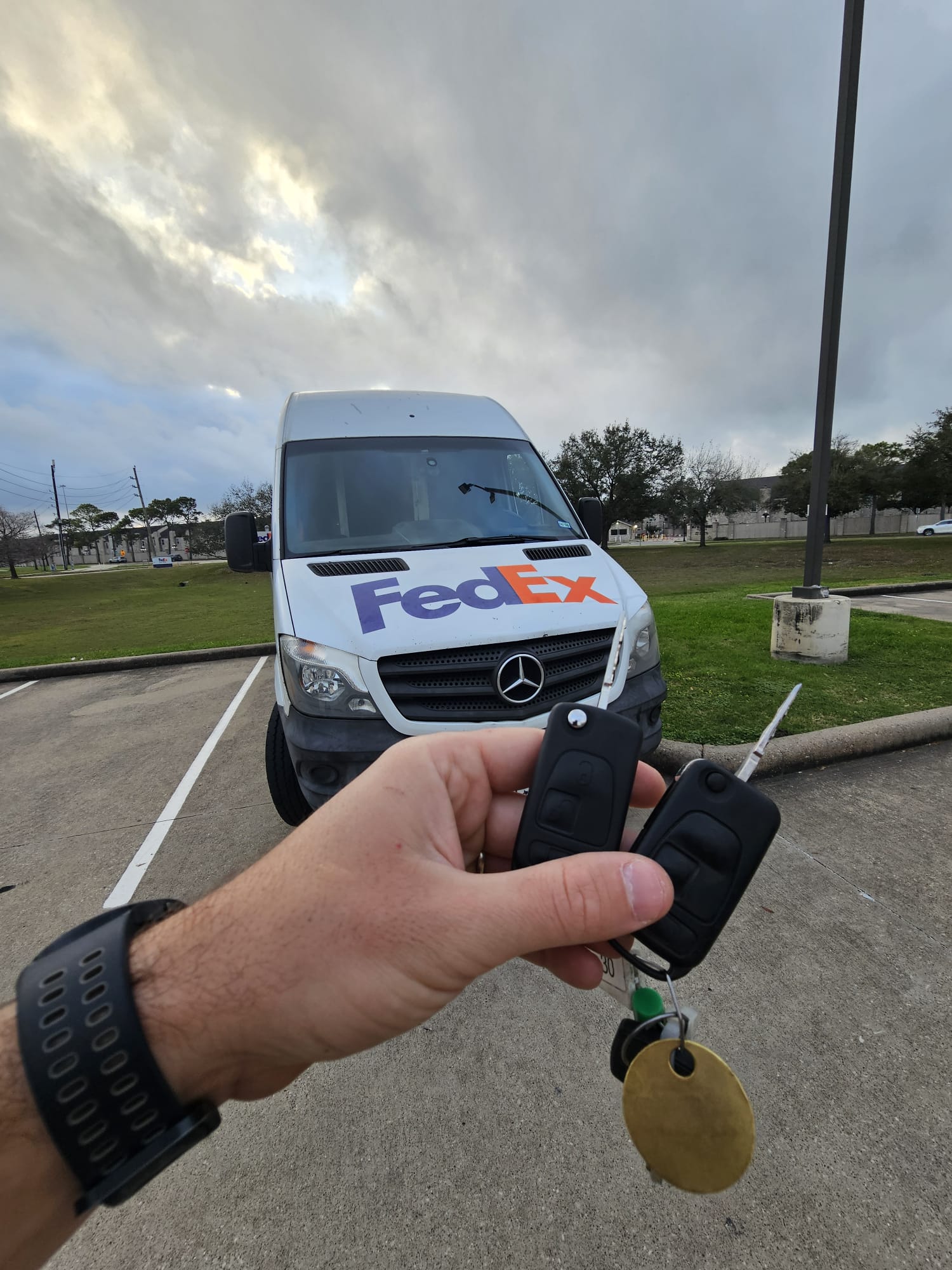 Mercedes-Benz Sprinter key replacement at parking lot , flip key fob in hand, Houston TX