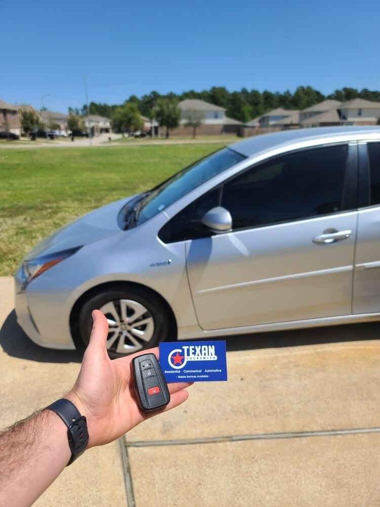 Toyota Prius key replacement with Texan Locksmith business card